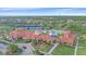 Community clubhouse with pool and tennis courts at 1724 Hyssop Loop, North Port, FL 34289