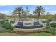 Del Webb Cypress Falls community entrance with a fountain at 1724 Hyssop Loop, North Port, FL 34289