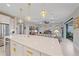 Open concept kitchen with large island and breakfast bar at 1724 Hyssop Loop, North Port, FL 34289