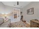 Home office features a couch and access to another room at 1724 Hyssop Loop, North Port, FL 34289