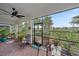 Spacious screened porch overlooking a beautiful backyard view at 1724 Hyssop Loop, North Port, FL 34289