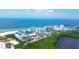 Aerial view of beachfront property with resort amenities at 2110 Benjamin Franklin Dr # 105, Sarasota, FL 34236