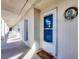 Building exterior showing hallway and entrance to condo at 2110 Benjamin Franklin Dr # 105, Sarasota, FL 34236
