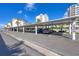 Covered parking area with ocean views at 2110 Benjamin Franklin Dr # 105, Sarasota, FL 34236
