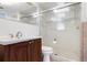 Bathroom with vanity, toilet and shower with glass doors at 2332 Pinehurst St, Sarasota, FL 34231