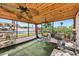 Relaxing screened porch with seating and plants at 2506 41St E St, Bradenton, FL 34208