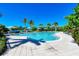 Resort-style pool with lounge chairs at 321 Sapphire Lake Dr # 202, Bradenton, FL 34209