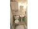 Small half bathroom with pedestal sink and toilet at 3333 26Th E Ave # 1148, Bradenton, FL 34208