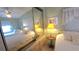 Relaxing bedroom with twin beds and mirrored closet at 3333 26Th E Ave # 1148, Bradenton, FL 34208