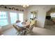 Charming dining area with a round table and comfortable seating and neutral colored decor at 3333 26Th E Ave # 1148, Bradenton, FL 34208