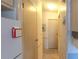 A long hallway with doors leading to other rooms at 3333 26Th E Ave # 1148, Bradenton, FL 34208