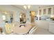 Charming kitchen that opens to the dining and living areas, promoting a seamless living experience at 3333 26Th E Ave # 1148, Bradenton, FL 34208