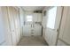 Laundry room with washer, dryer, and storage at 3333 26Th E Ave # 1148, Bradenton, FL 34208