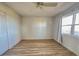 Bright bedroom with wood-look floors and window at 3640 Ironwood Cir # 601N, Bradenton, FL 34209