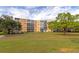 Exterior view of the condo building and surrounding landscape at 3640 Ironwood Cir # 601N, Bradenton, FL 34209