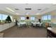 Bright community room with tables and chairs, perfect for gatherings at 3640 Ironwood Cir # 601N, Bradenton, FL 34209