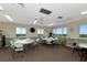 Bright community room with tables and chairs, perfect for gatherings at 3640 Ironwood Cir # 601N, Bradenton, FL 34209