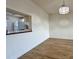 Dining area with kitchen pass-through and laminate flooring at 3640 Ironwood Cir # 601N, Bradenton, FL 34209