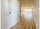 Bright condo entryway with wood-look floors leading to living room at 3640 Ironwood Cir # 601N, Bradenton, FL 34209
