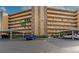 Condo building exterior with parking and landscaping at 3640 Ironwood Cir # 601N, Bradenton, FL 34209