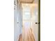 Bright hallway with light wood-look floors at 3640 Ironwood Cir # 601N, Bradenton, FL 34209