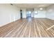 Spacious living room featuring light laminate wood floors at 3640 Ironwood Cir # 601N, Bradenton, FL 34209