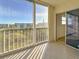 Enclosed patio with tile flooring, sliding glass doors, and scenic outdoor views at 3640 Ironwood Cir # 601N, Bradenton, FL 34209