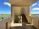 Exterior stairwell with a view of lush greenery at 3640 Ironwood Cir # 601N, Bradenton, FL 34209