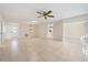 Large living area with tile floors and access to other rooms at 3941 Oakhurst Blvd # 3014, Sarasota, FL 34233