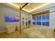 Main bedroom with ocean view and four-poster bed at 4125 Gulf Of Mexico Dr # S201, Longboat Key, FL 34228