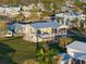 Elevated home with a large deck, and a screened porch at 4528 106Th W St, Bradenton, FL 34210