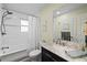 Updated bathroom with marble vanity and a shower/tub combo at 4528 106Th W St, Bradenton, FL 34210