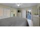 Spacious bedroom with access to a private bathroom and balcony at 4528 106Th W St, Bradenton, FL 34210