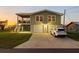 Two-story home with attached garage and waterfront view at 4528 106Th W St, Bradenton, FL 34210