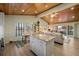 Open kitchen with island and stainless steel appliances at 4528 106Th W St, Bradenton, FL 34210