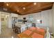 Eat-in kitchen boasts granite counters, stainless steel appliances, and an island at 4528 106Th W St, Bradenton, FL 34210