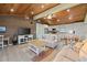 Open concept living area with vaulted ceiling and kitchen at 4528 106Th W St, Bradenton, FL 34210