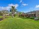 Expansive backyard with canal view at 4975 Waterbridge Down, Sarasota, FL 34235