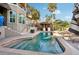 Relaxing pool area with deck and views of tropical landscape at 5159 Oxford Dr, Sarasota, FL 34242