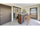 Entertainment bar features a wood countertop, seating, and a glass cabinet, great for entertaining guests at 521 Cummings St, Sarasota, FL 34242