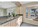 Elegant bathroom with double vanity and granite countertop at 521 Cummings St, Sarasota, FL 34242