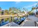 This property features a private boat lift for easy access to the waterfront and boating adventures at 521 Cummings St, Sarasota, FL 34242