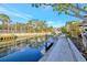 Picturesque view of the canal and waterfront from the property's dock, perfect for boating and relaxation at 521 Cummings St, Sarasota, FL 34242