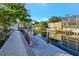 Scenic waterfront view from the dock, perfect for relaxing and enjoying the tranquility of canal living at 521 Cummings St, Sarasota, FL 34242