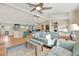 Open floor plan living area with modern decor, stylish furniture, and a fireplace feature at 521 Cummings St, Sarasota, FL 34242