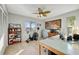 Home office with wood floors, ceiling fan and a desk at 521 Cummings St, Sarasota, FL 34242