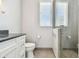 Clean bathroom with a walk-in shower and granite countertop at 5531 2Nd Avenue W Cir, Palmetto, FL 34221