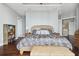Spacious bedroom with king-size bed and hardwood floors at 5531 2Nd Avenue W Cir, Palmetto, FL 34221