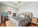 Main bedroom with king-size bed and water views at 5531 2Nd Avenue W Cir, Palmetto, FL 34221