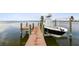 Private boat dock featuring a lift for easy boat access at 5531 2Nd Avenue W Cir, Palmetto, FL 34221